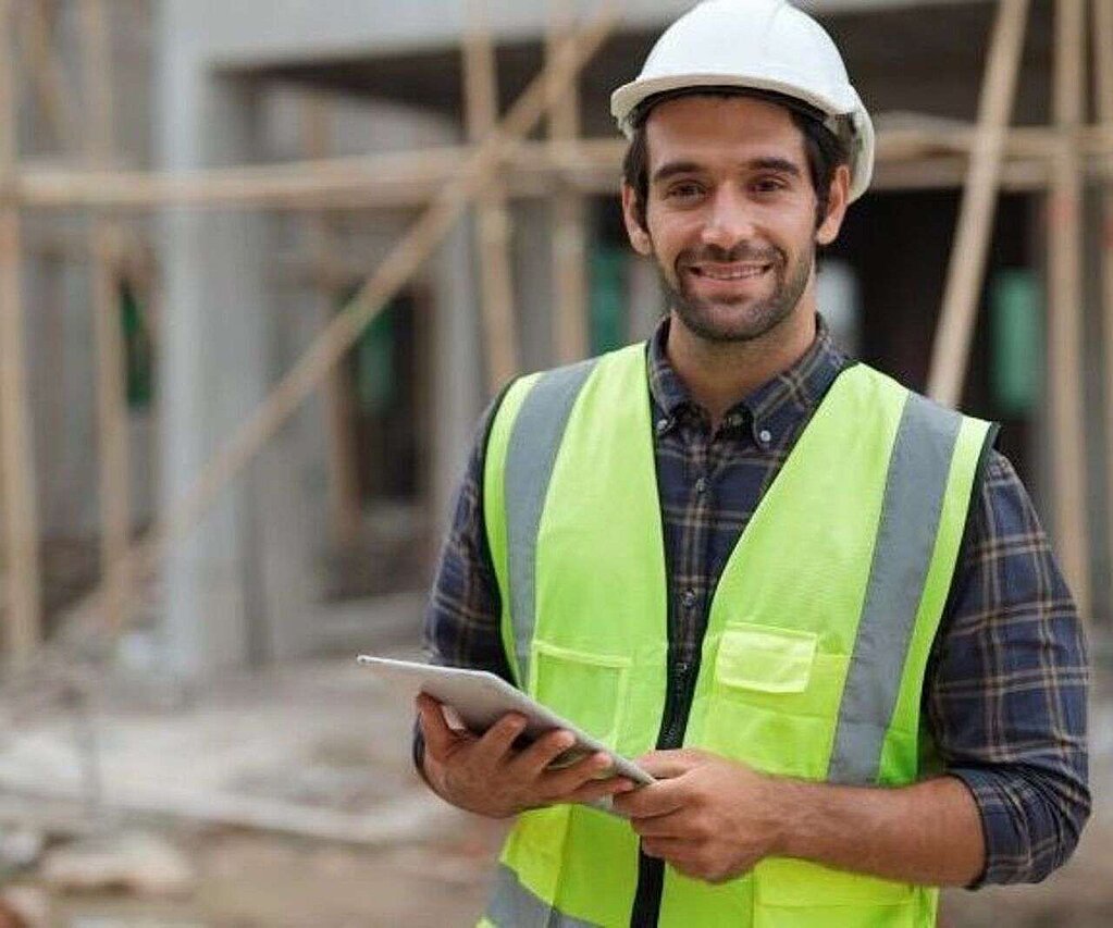 Young man with helmet and protective vest