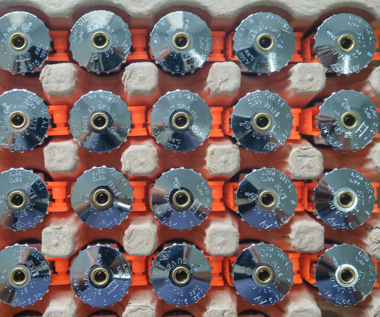 Many silver sprinkler heads