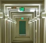 Engineer with 2 plans shows thumbs up